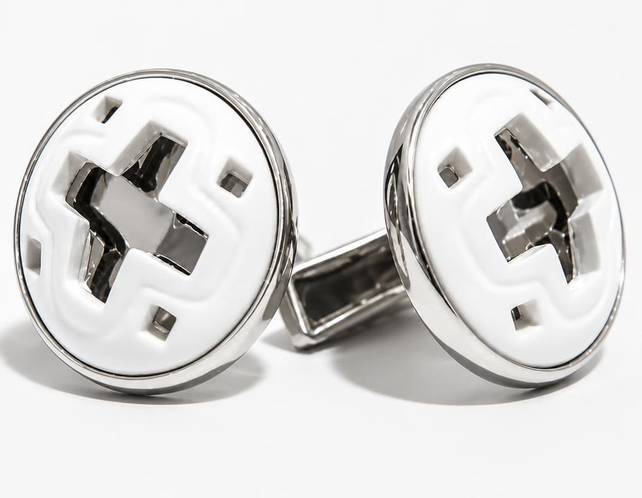 Yazılı meerschaum and silver cufflinks by Sinem Hallı, featured in Tasarım Gazetesi coverage of the 2010 Eskişehir meerschaum design competition.